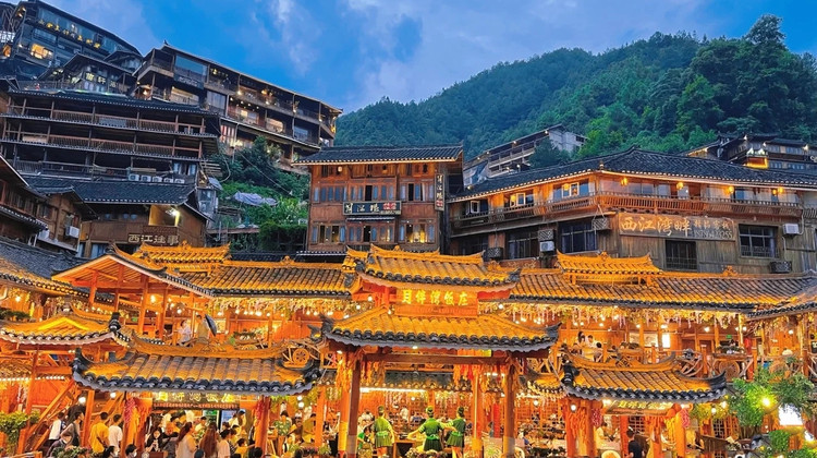 • China + Guizhou + Huangguoshu Waterfall + Libo Xiaoqikong Scenic Area + Xijiang Qianhu Miao Village