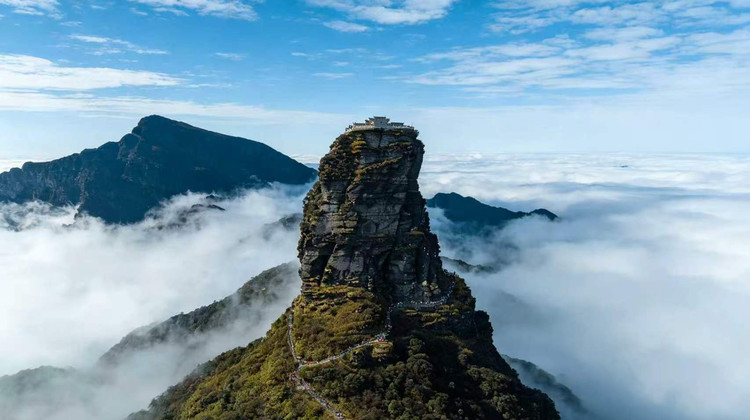 • China + Guizhou + Huangguoshu Waterfall + Libo Xiaoqikong Scenic Area + Xijiang Qianhu Miao Village + Zhenyuan Ancient Town + Mount Fanjing